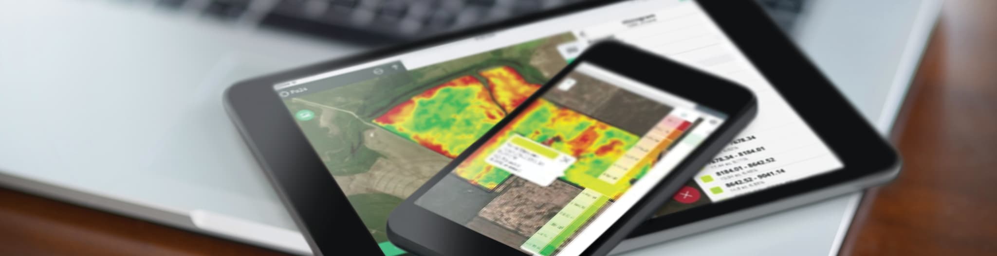 tablets with a map of a field
