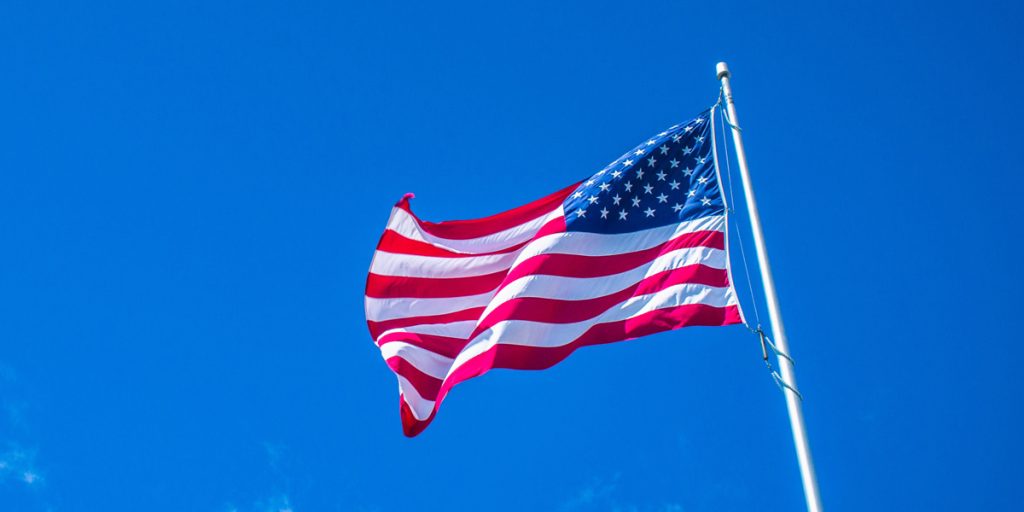 An American flag blowing in the wind